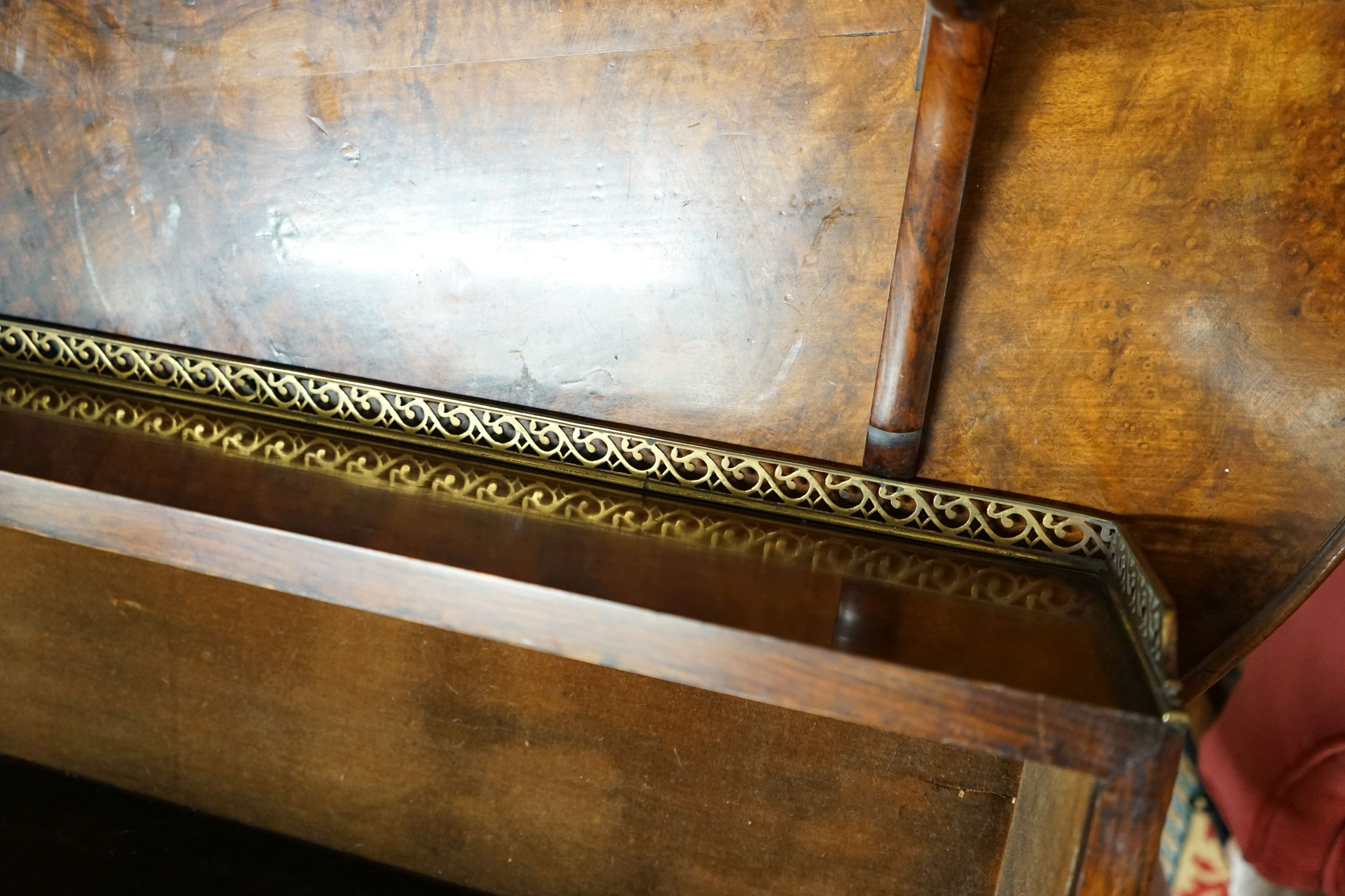 A pair of Victorian style rosewood wall brackets with brass galleried tops, width 94cm, depth 17cm, height 53cm